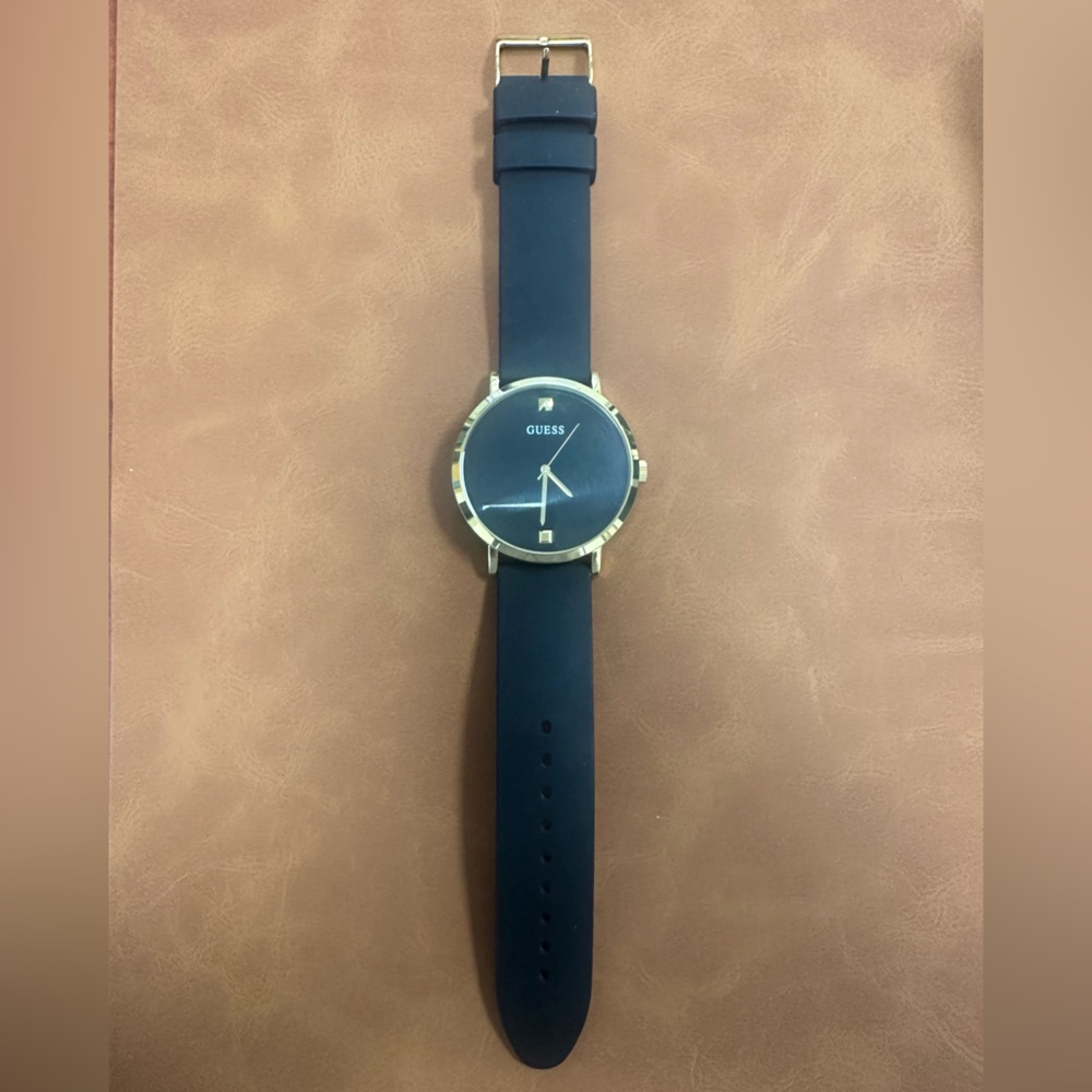 GUESS Supernova Men’s  Black and Gold Watch